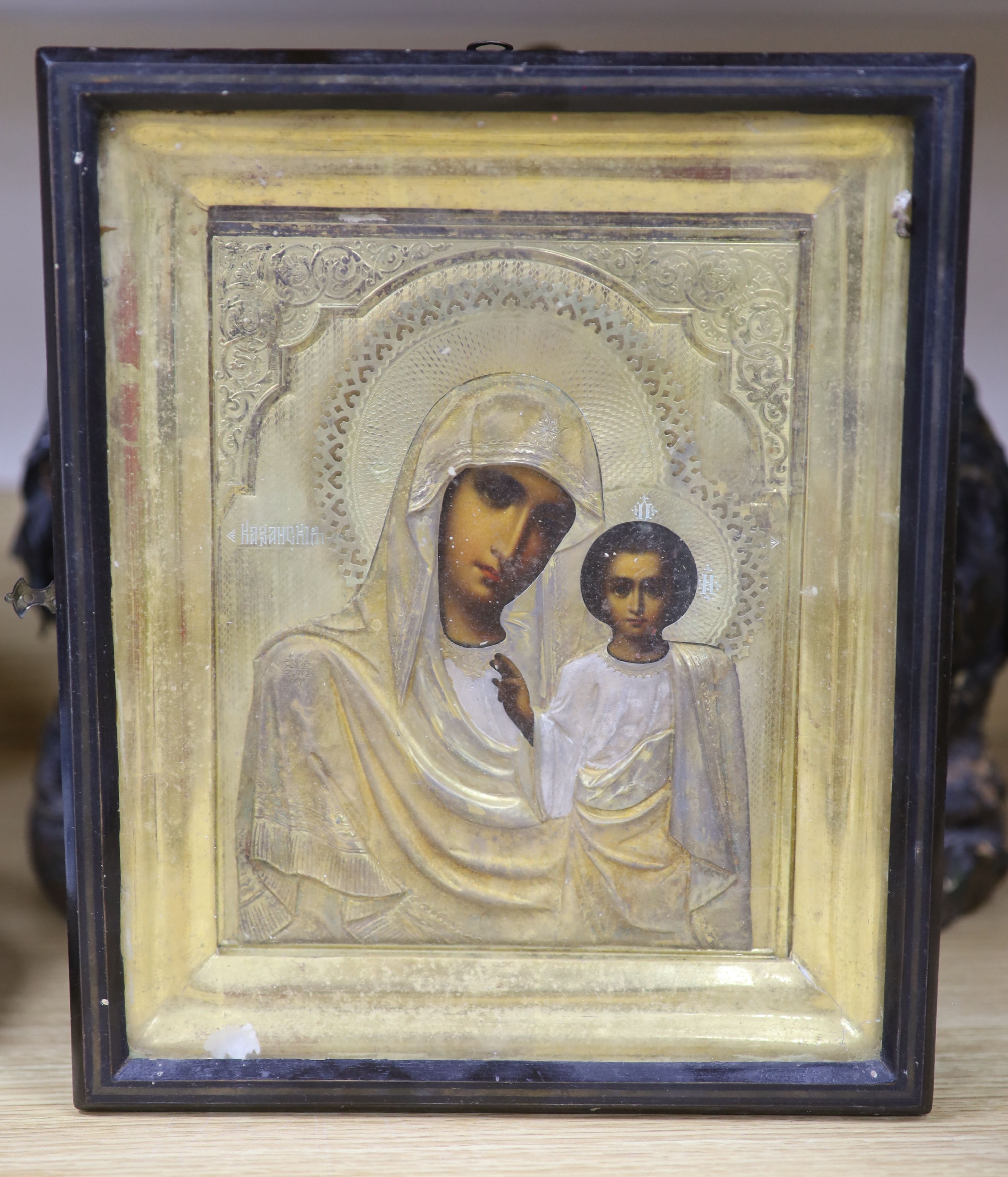 Russian School, tempera on panel, Icon of the Virgin and Child, with silver gilt oklad, 22 x 17cm, case overall 29 x 25cm